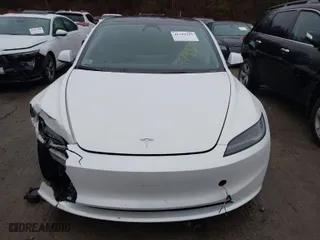 2024 Tesla Model 3 Long Range with VIN 5YJ3E1EB0RF812296, listed as a IAAI auction lot 41799217 with 6,990 mi miles. Bid and sale history available at carsss.com. Image 13.
