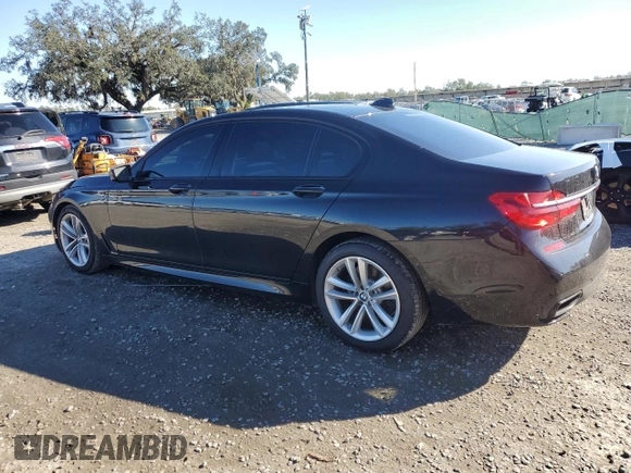 2016 BMW 7 Series 750i with VIN WBA7F0C5XGGL99549, listed as a Copart auction lot 41880015 with 54,181 mi miles and Salvage Title. Bid and sale history available at carsss.com. Image 2.