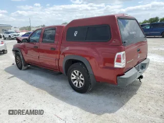2008 Mitsubishi Raider LS z VIN 1Z7HC28K58S588087, wystawiony jako Copart lot #72013544 z przebiegiem 164 134 mil mil oraz Nie do naprawy • Non repairable. Historia ofert i sprzedaży dostępna na DreamBid. Obrazek 2.
