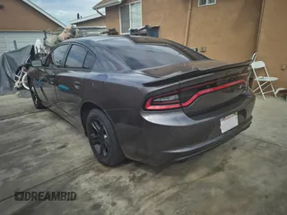 2020 Dodge Charger SXT with VIN 2C3CDXBG7LH232748, listed as a IAAI auction lot 42168856 with 26,527 mi miles. Bid and sale history available at carsss.com. Image 3.