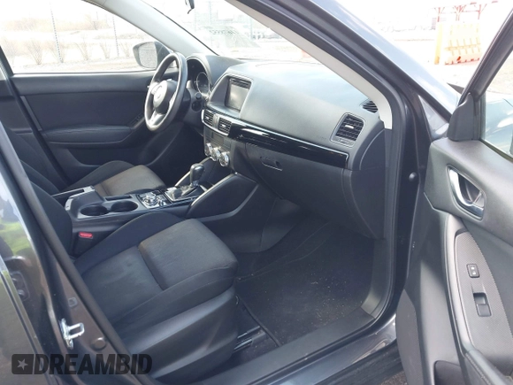 2016 Mazda CX-5 Sport with VIN JM3KE4BY5G0829927, listed as a IAAI auction lot 41678552 with 121,476 mi miles. Bid and sale history available at carsss.com. Image 5.