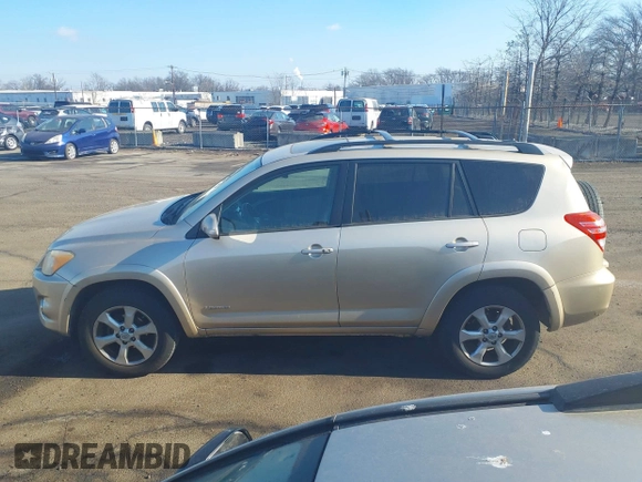 2010 Toyota RAV4 Ltd with VIN JTMDF4DV1A5020971, listed as a IAAI auction lot 41336888 with 214,838 mi miles. Bid and sale history available at carsss.com. Image 14.