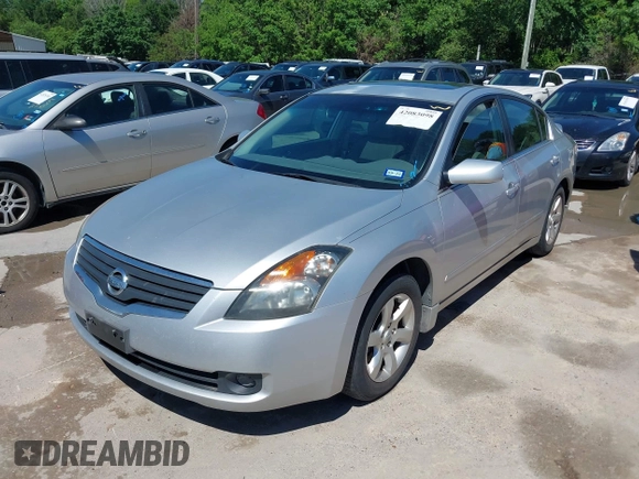 2007 Nissan Altima 2.5 with VIN 1N4AL21E27C138140, listed as a IAAI auction lot 42083098 with 189,799 mi miles. Bid and sale history available at carsss.com. Image 2.