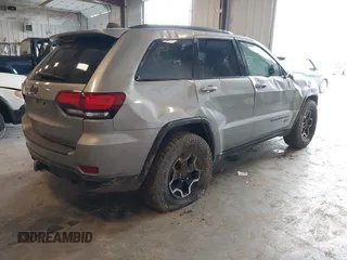 2016 Jeep Grand Cherokee Laredo with VIN 1C4RJFAG6GC366301, listed as a IAAI auction lot 42275011 with 203,133 mi miles and . Bid and sale history available at DreamBid. Image 4.