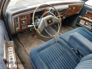 1990 Cadillac Brougham z VIN 1G6DW5473LR712137, wystawiony jako Copart lot #57914885 z przebiegiem Nie podano mil oraz Tytuł czysty. Historia ofert i sprzedaży dostępna na DreamBid. Obrazek 8.