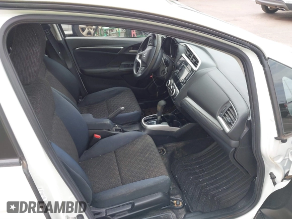 2016 Honda Fit LX z VIN JHMGK5H51GX038519, wystawiony jako IAAI lot #41809636 z przebiegiem 96 894 mil mil oraz . Historia ofert i sprzedaży dostępna na DreamBid. Obrazek 5.