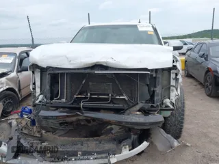 2012 Chevrolet Tahoe LTZ with VIN 1GNSCCE00CR197950, listed as a IAAI auction lot 42393693 with 296,161 mi miles and . Bid and sale history available at DreamBid. Image 6.