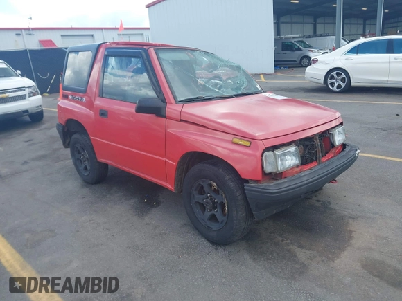 1995 Chevrolet Tracker z VIN 2CNBJ1869S6902771, wystawiony jako IAAI lot #41997456 z przebiegiem 171 629 mil mil oraz . Historia ofert i sprzedaży dostępna na DreamBid. Obrazek 1.