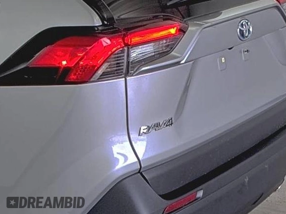 2022 Toyota RAV4 Hybrid XLE Premium with VIN 4T3B6RFV5NU085564, listed as a IAAI auction lot 42854215 with 49,616 mi miles and . Bid and sale history available at DreamBid. Image 18.