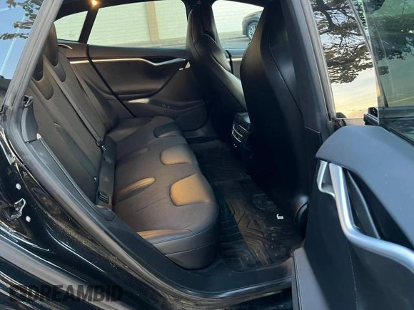 2017 Tesla Model S 60 with VIN 5YJSA1E15HF219286, listed as a Copart auction lot 57360515 with 44,520 mi miles and Salvage title. Bid and sale history available at DreamBid. Image 6.