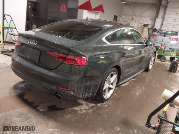 2018 Audi A5 Sportback Prestige with VIN WAUFNCF58JA011045, listed as a IAAI auction lot 41594382 with 63,583 mi miles. Bid and sale history available at carsss.com. Image 4.