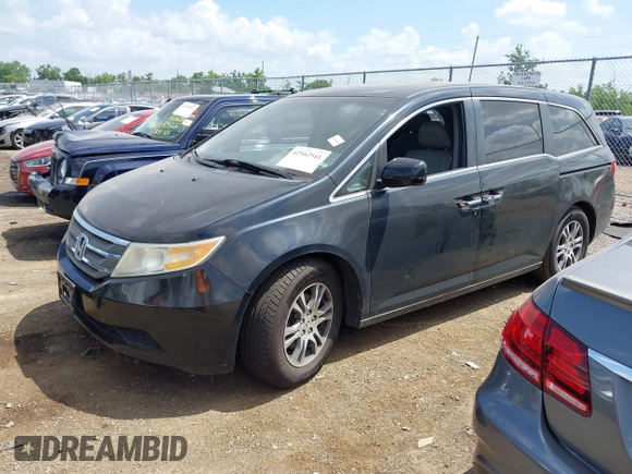 2011 Honda Odyssey EX-L with VIN 5FNRL5H62BB063125, listed as a IAAI auction lot 42562541 with 140,787 mi miles and . Bid and sale history available at DreamBid. Image 17.