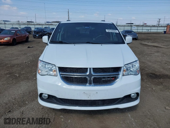2019 Dodge Grand Caravan SXT with VIN 2C4RDGCG7KR663085, listed as a Copart auction lot 52530605 with 64,590 mi miles and Salvage Title. Bid and sale history available at DreamBid. Image 5.