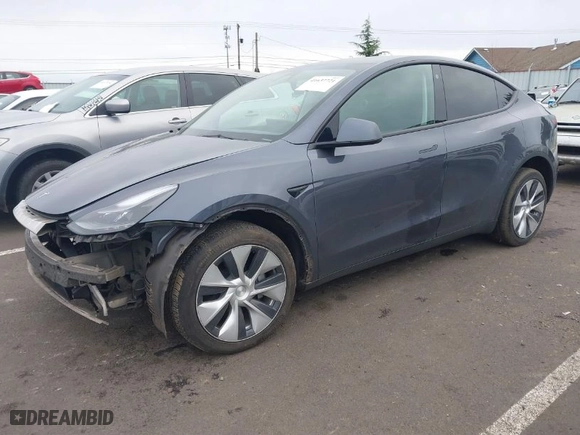 2023 Tesla Model Y Long Range with VIN 7SAYGDEE5PF685301, listed as a IAAI auction lot 41637721 with 30,972 mi miles. Bid and sale history available at carsss.com. Image 2.