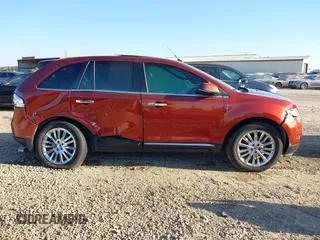 2014 Lincoln MKX with VIN 2LMDJ8JK2EBL00416, listed as a IAAI auction lot 40693429 with 118,427 mi miles. Bid and sale history available at carsss.com. Image 13.