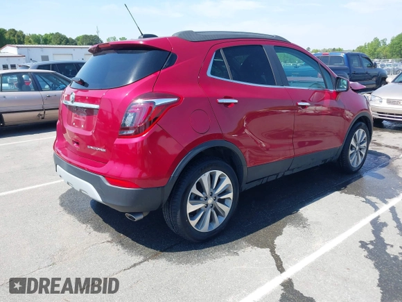 2020 Buick Encore Preferred with VIN KL4CJASB2LB063490, listed as a IAAI auction lot 42037574 with 57,350 mi miles. Bid and sale history available at carsss.com. Image 4.