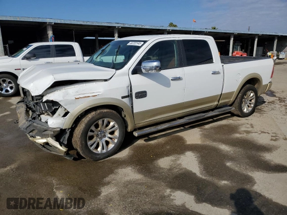 2015 Ram 1500 Laramie Limited with VIN 1C6RR7WM6FS718706, listed as a Copart auction lot 44722145 with Not provided miles and Salvage title. Bid and sale history available at DreamBid. Image 1.