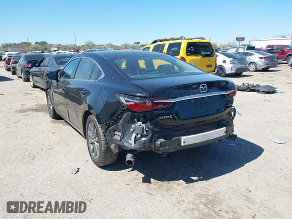 2020 Mazda 6 Sport with VIN JM1GL1UM2L1519932, listed as a IAAI auction lot 41712367 with 83,497 mi miles and . Bid and sale history available at DreamBid. Image 3.