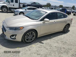 2019 Ford Fusion Titanium with VIN 3FA6P0RU0KR206813, listed as a Copart auction lot 63780625 with 169,166 mi miles and Salvage title. Bid and sale history available at DreamBid. Image 1.
