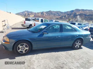 2001 Lincoln LS w/Base Pkg with VIN 1LNHM87A31Y617332, listed as a IAAI auction lot 41317767 with 141,931 mi miles. Bid and sale history available at carsss.com. Image 14.