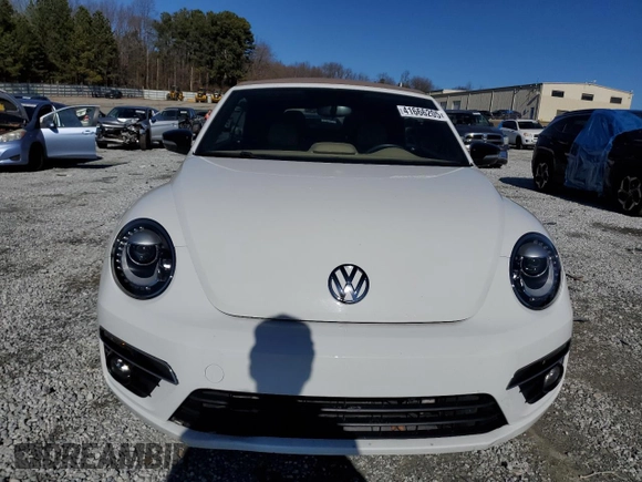 2015 Volkswagen Beetle with VIN 3VW7S7AT1FM818382, listed as a Copart auction lot 41666205 with 47,429 mi miles and Salvage Title. Bid and sale history available at DreamBid. Image 5.