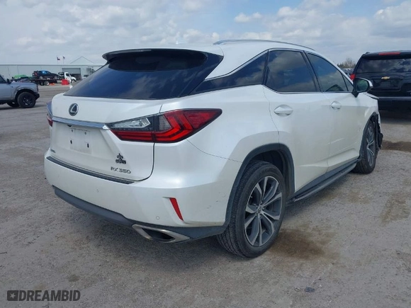 2016 Lexus RX 350 with VIN 2T2ZZMCA7GC033985, listed as a IAAI auction lot 41774815 with 111,732 mi miles. Bid and sale history available at carsss.com. Image 4.
