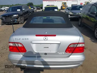 2003 Mercedes-Benz CLK 430 z VIN WDBLK70G13T130450, wystawiony jako IAAI lot #42280960 z przebiegiem 83 013 mil mil oraz . Historia ofert i sprzedaży dostępna na DreamBid. Obrazek 17.