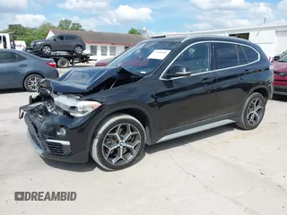 2019 BMW X1 sDrive28i with VIN WBXHU7C56K5L10962, listed as a IAAI auction lot 41904580 with 37,213 mi miles. Bid and sale history available at carsss.com. Image 2.