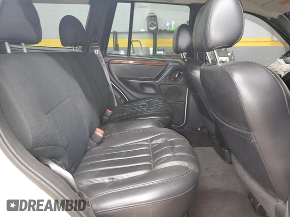 1999 Jeep Grand Cherokee Limited с VIN 1J4GW68S8XC627893, выставлен на аукционе Copart как лот 53284365 с пробегом 233 996 миль миль и Списание • Salvage title. История ставок и продаж доступна на DreamBid. Изображение 11.