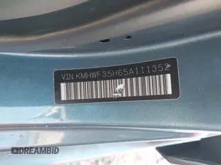 2005 Hyundai Sonata GLS with VIN KMHWF35H65A111352, listed as a IAAI auction lot 42006083 with 283,261 mi miles. Bid and sale history available at carsss.com. Image 9.