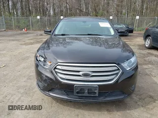 2013 Ford Taurus SEL with VIN 1FAHP2E87DG220389, listed as a IAAI auction lot 41930118 with 128,324 mi miles and . Bid and sale history available at carsss.com. Image 12.