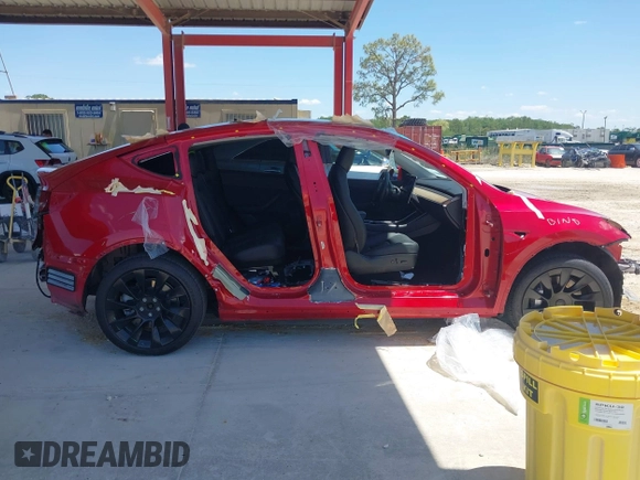 2020 Tesla Model Y Long Range with VIN 5YJYGDEE0LF029496, listed as a IAAI auction lot 41977695 with 47,958 mi miles and . Bid and sale history available at DreamBid. Image 12.