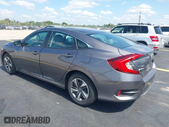 2020 Honda Civic LX with VIN 19XFC2F68LE007735, listed as a IAAI auction lot 42215294 with 3,849 mi miles and . Bid and sale history available at DreamBid. Image 3.