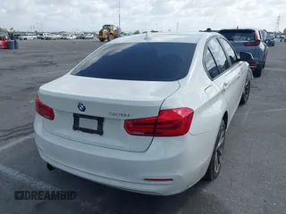 2018 BMW 3 Series 320i with VIN WBA8A9C5XJAH12264, listed as a IAAI auction lot 41947856 with 108,785 mi miles. Bid and sale history available at carsss.com. Image 4.
