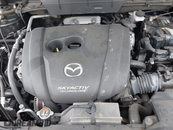 2018 Mazda CX-5 Touring with VIN JM3KFACM0J0315739, listed as a IAAI auction lot 40516262 with 60,727 mi miles. Bid and sale history available at carsss.com. Image 10.
