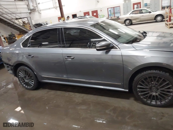 2015 Volkswagen Passat 2.0L TDI SE w/Sunroof with VIN 1VWBV7A3XFC094226, listed as a IAAI auction lot 41838239 with 169,737 mi miles. Bid and sale history available at carsss.com. Image 14.