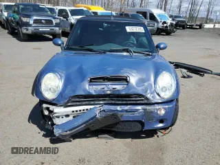 2007 MINI Convertible S z VIN WMWRH33507TL95604, wystawiony jako Copart lot #53272395 z przebiegiem 94 957 mil mil oraz Szkoda całkowita • Salvage title. Historia ofert i sprzedaży dostępna na DreamBid. Obrazek 5.