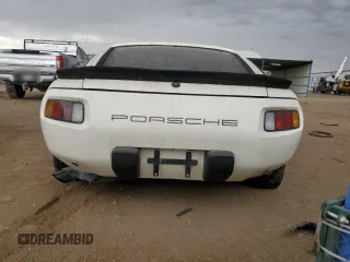 1984 Porsche 928 z VIN WP0JB0921ES860293, wystawiony jako Copart lot #70132694 z przebiegiem 134 907 mil mil oraz Tytuł czysty. Historia ofert i sprzedaży dostępna na DreamBid. Obrazek 7.