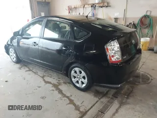 2009 Toyota Prius with VIN JTDKB20U993491553, listed as a IAAI auction lot 42103083 with 166,562 mi miles. Bid and sale history available at carsss.com. Image 3.