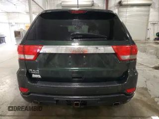 2011 Jeep Grand Cherokee 70th Anniversary with VIN 1J4RR4GT3BC736981, listed as a Copart auction lot 49171525 with 127,438 mi miles and Salvage Title. Bid and sale history available at carsss.com. Image 6.