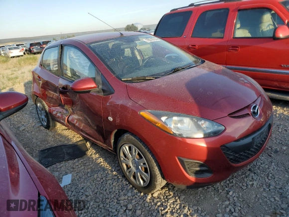2014 Mazda 2 Sport with VIN JM1DE1KZ5E0186789, listed as a Copart auction lot 70519794 with 106,127 mi miles and Salvage Title. Bid and sale history available at carsss.com. Image 4.