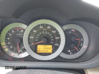 2009 Toyota RAV4 with VIN JTMZF33V59D008745, listed as a IAAI auction lot 41929275 with 126,880 mi miles and . Bid and sale history available at DreamBid. Image 7.