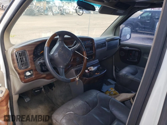 2000 GMC Savana z VIN 1GDFG15RXY1219889, wystawiony jako Copart lot #76055684 z przebiegiem 129 427 mil mil oraz Szkoda całkowita • Salvage title. Historia ofert i sprzedaży dostępna na DreamBid. Obrazek 8.