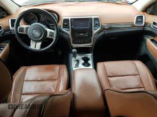 2012 Jeep Grand Cherokee Overland with VIN 1C4RJECT2CC146300, listed as a Copart auction lot 51774655 with 91,947 mi miles and Salvage Title. Bid and sale history available at carsss.com. Image 8.