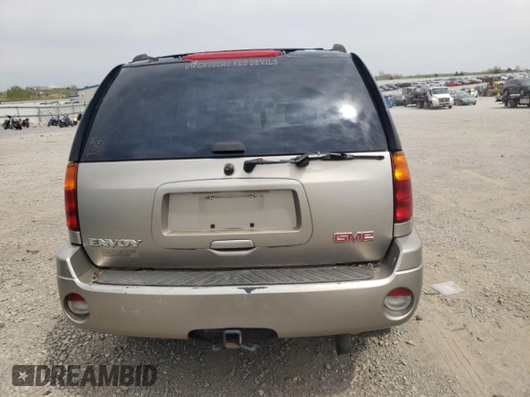 2003 GMC Envoy SLE z VIN 1GKDT13S332365071, wystawiony jako Copart lot #52811295 z przebiegiem Nie podano mil oraz Szkoda całkowita • Salvage title. Historia ofert i sprzedaży dostępna na DreamBid. Obrazek 6.