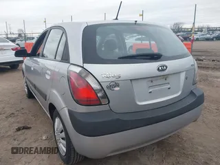 2009 Kia Rio LX with VIN KNADE243596544181, listed as a IAAI auction lot 41876733 with 200,216 mi miles. Bid and sale history available at carsss.com. Image 3.