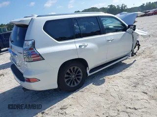 2021 Lexus GX 460 Premium with VIN JTJAM7BX0M5302132, listed as a IAAI auction lot 42462529 with 57,564 mi miles and . Bid and sale history available at DreamBid. Image 4.