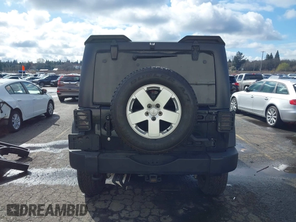 2011 Jeep Wrangler Unlimited Rubicon with VIN 1J4BA6H13BL513311, listed as a IAAI auction lot 41809207 with 124,716 mi miles and . Bid and sale history available at DreamBid. Image 16.