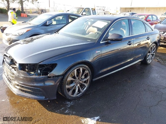 2012 Audi A6 3.0T Prestige with VIN WAUHGBFC8CN174740, listed as a IAAI auction lot 41439297 with 84,570 mi miles. Bid and sale history available at carsss.com. Image 2.