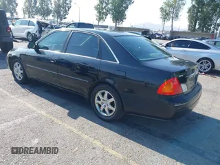 2000 Toyota Avalon XL with VIN 4T1BF28BXYU087172, listed as a IAAI auction lot 42000095 with 120,296 mi miles and . Bid and sale history available at DreamBid. Image 3.